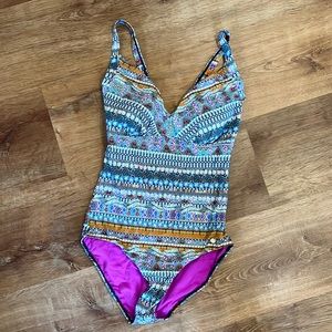 Multi color pattern one piece swim suit. Brand new without tags.